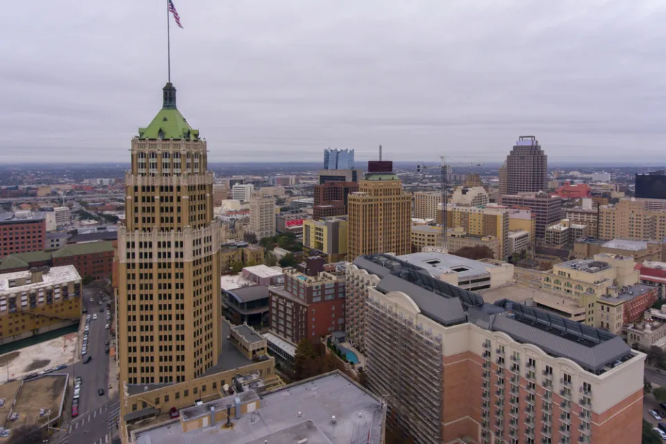 Aerial view of downtown San Antonio with Tower Life Building in foreground